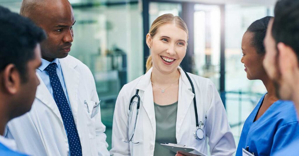 Shot of a team of doctors having a discussion in a hospital