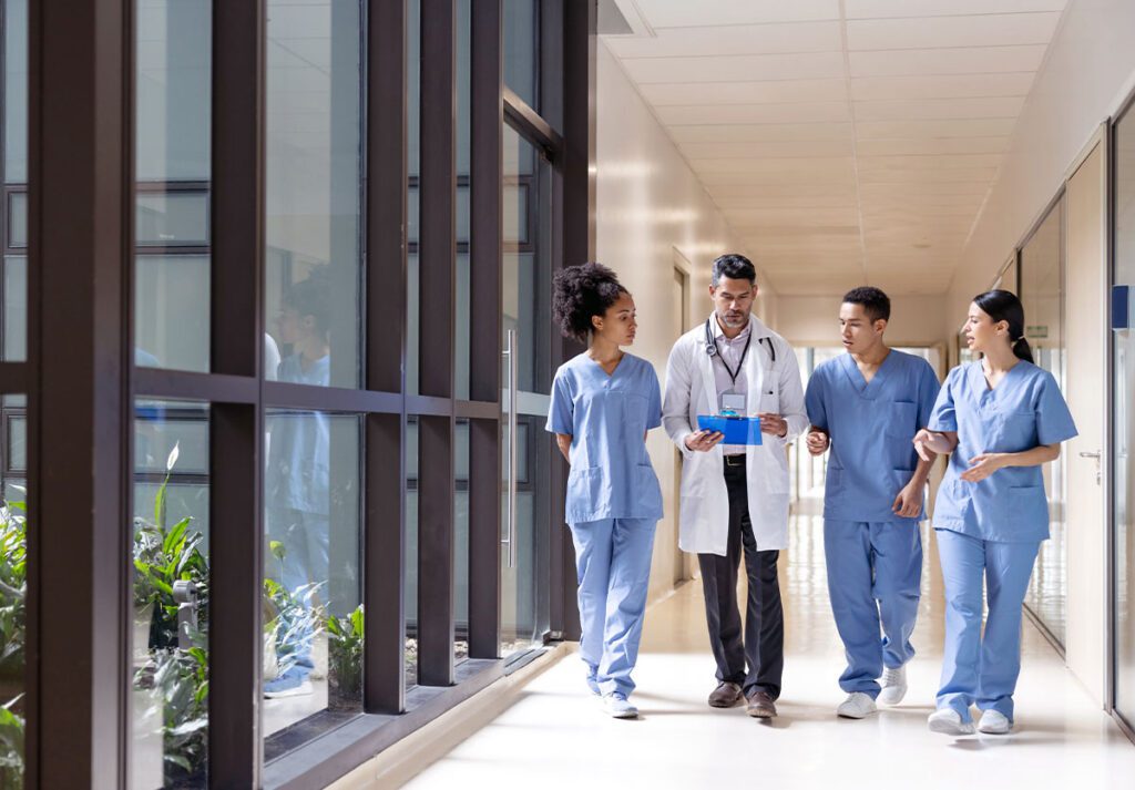 Physicians walking in hospital hallway