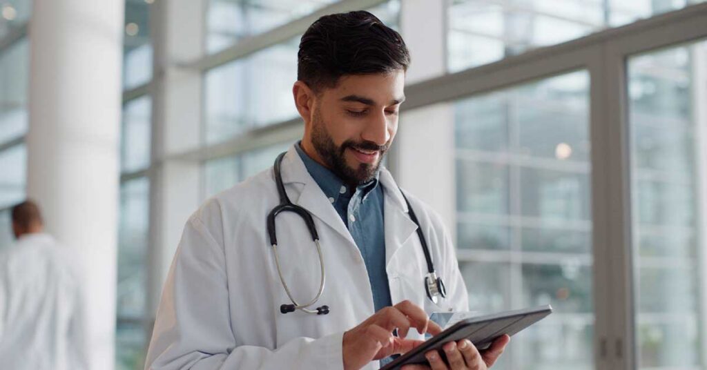 Man, doctor and tablet