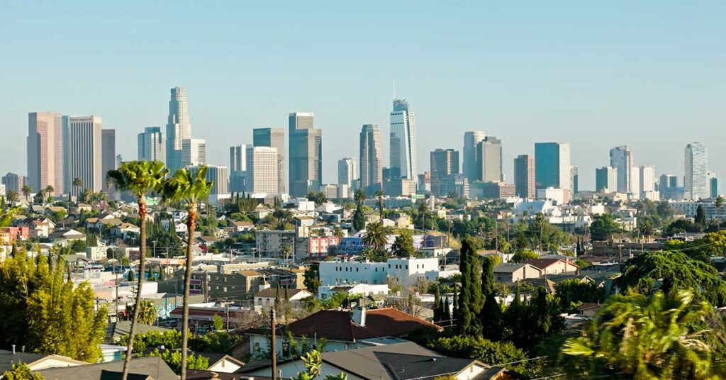 Aerial shot of the downtown Los Angeles skyline from over Silver Lake on a sunny day in Spring.